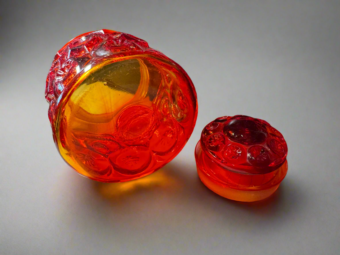 L. E. Smith Orange Raised Sunburst Moon Style Vanity Jar