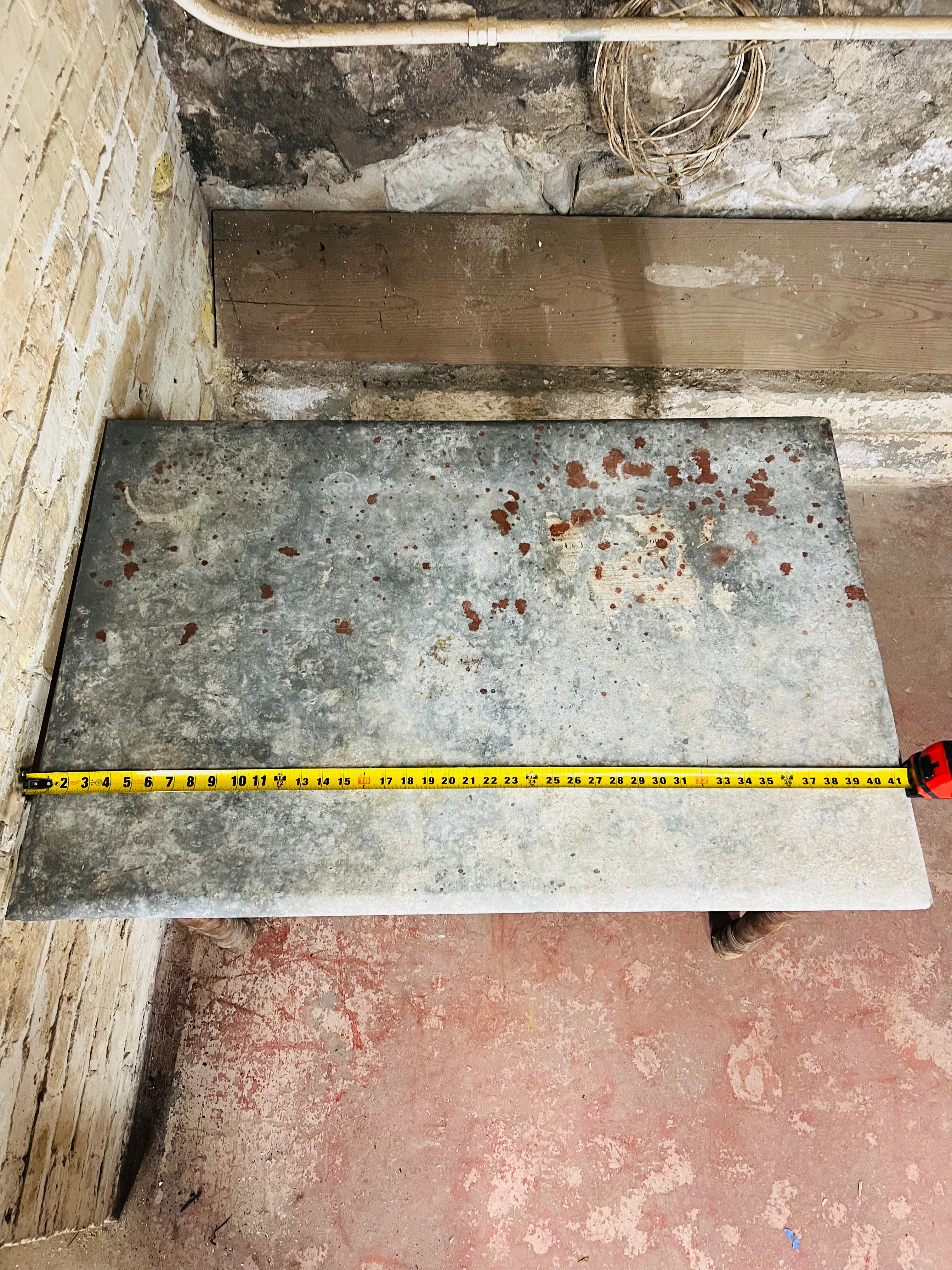 Vintage farm table with zinc top missing drawer.