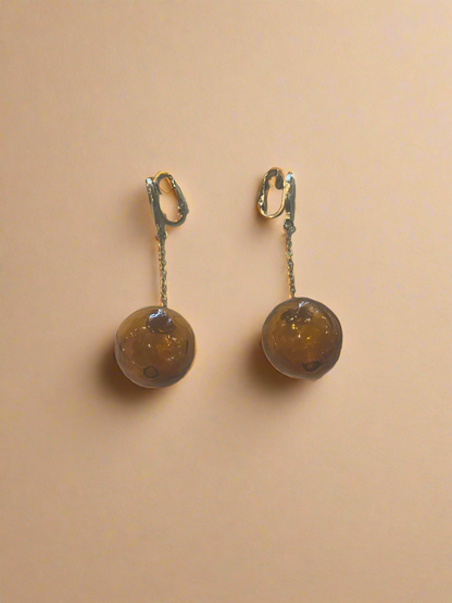 Amber Globe Dangling Earrings