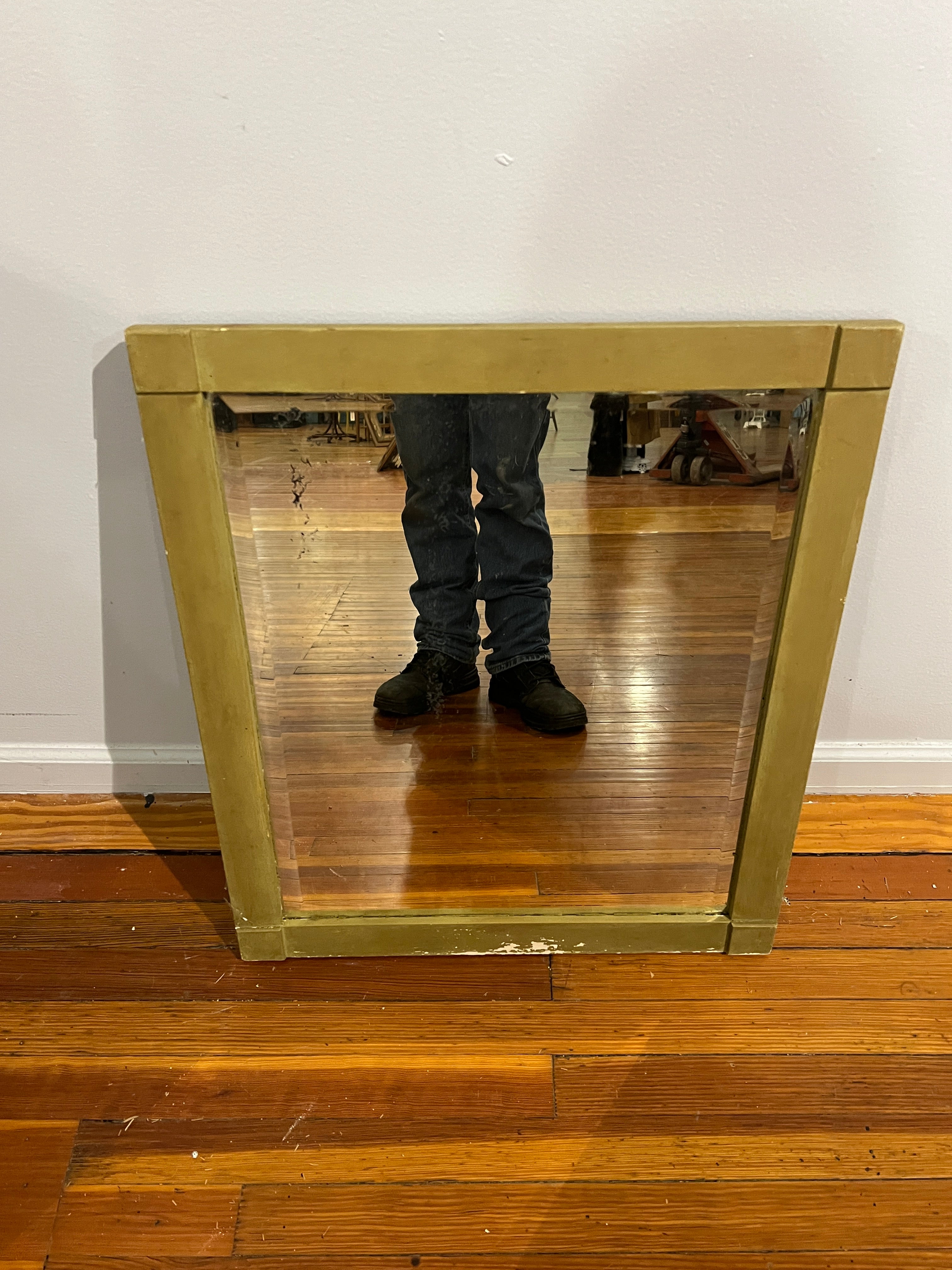 Mirror with gold colored frame