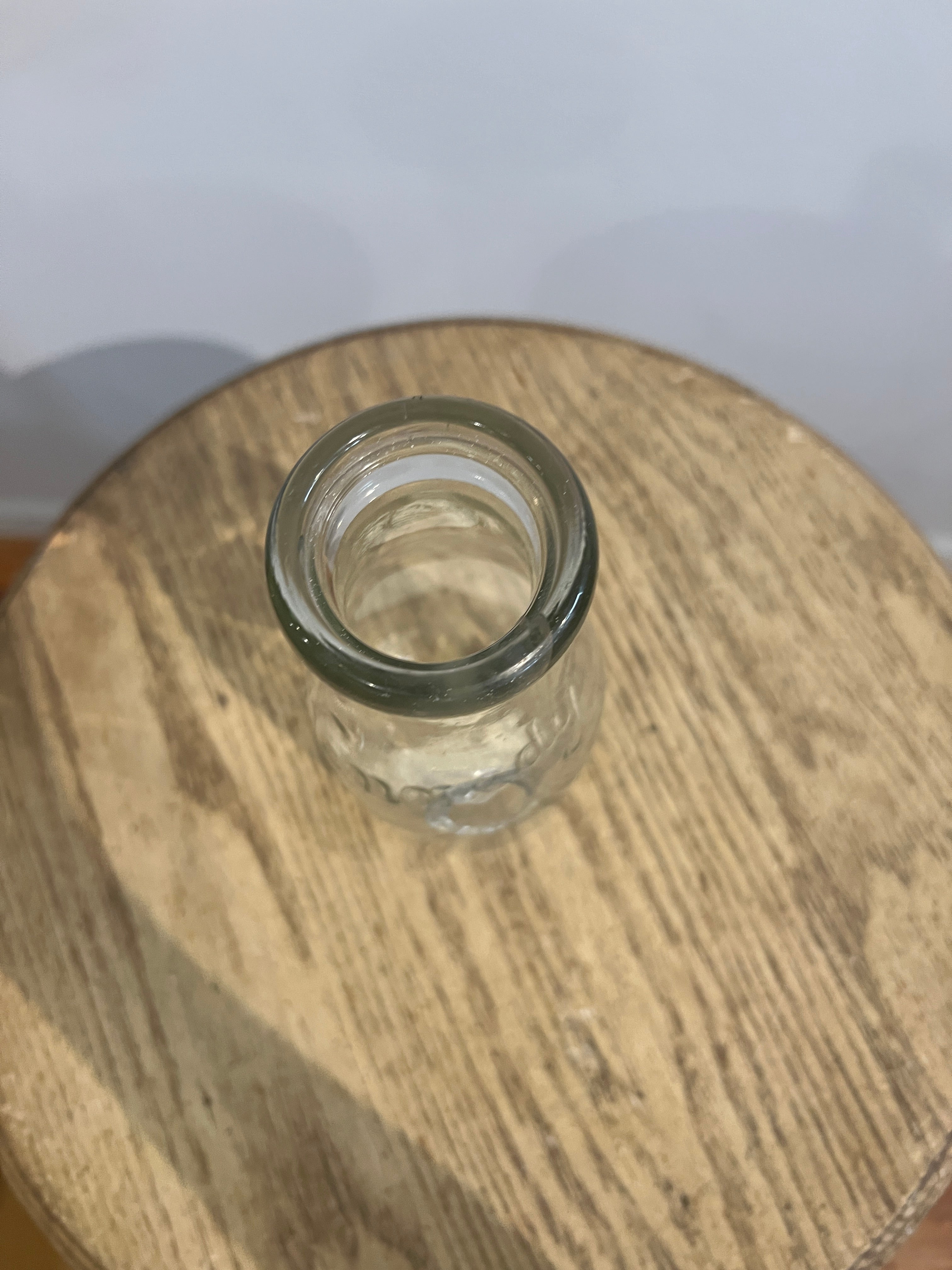 Antique glass milk bottle