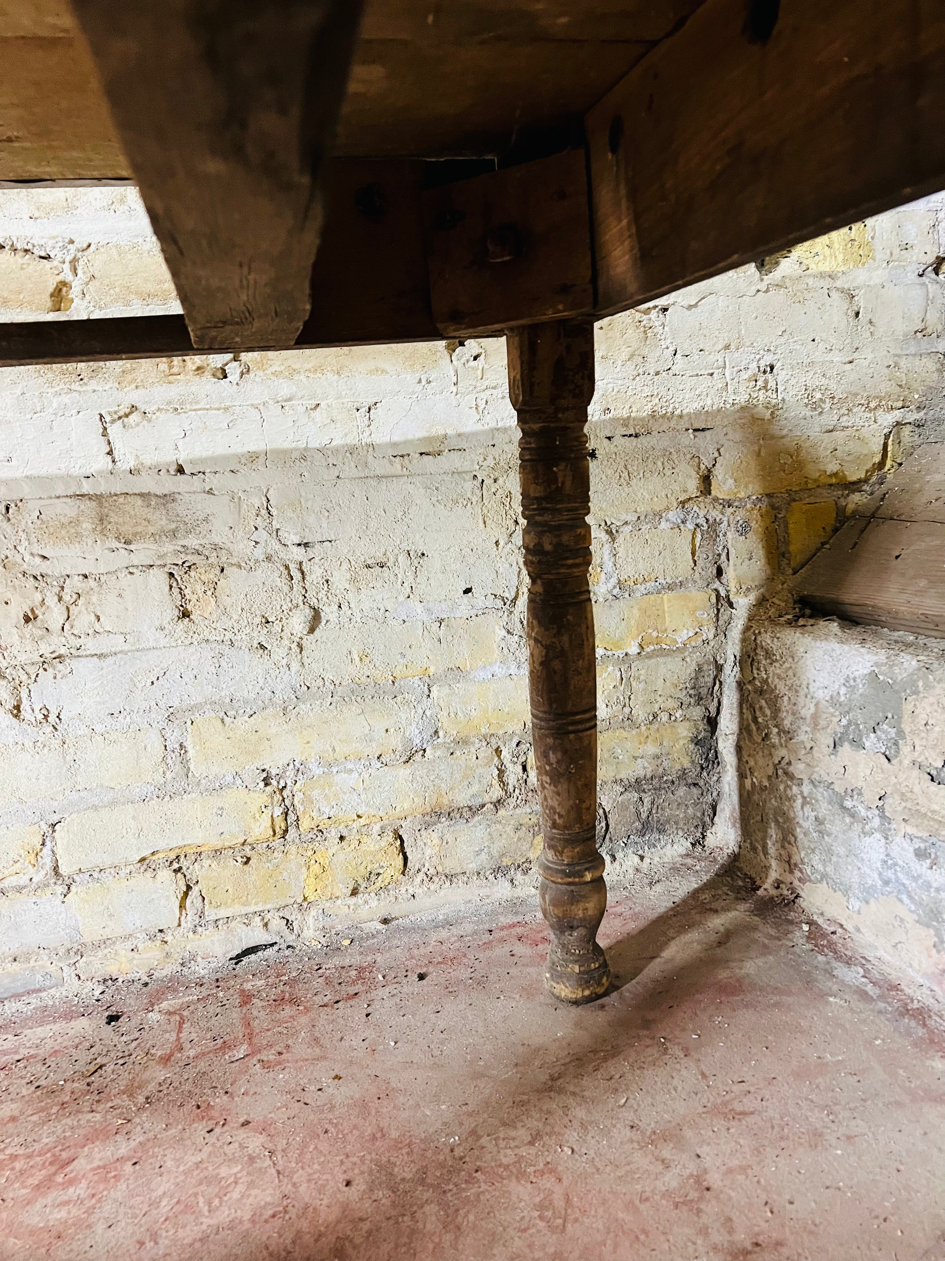 Vintage farm table with zinc top missing drawer.