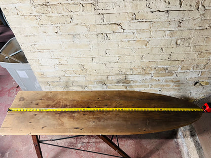 Vintage wooden folding ironing board.
