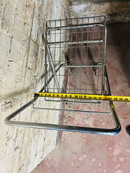 Vintage metal folding cart with wheels.