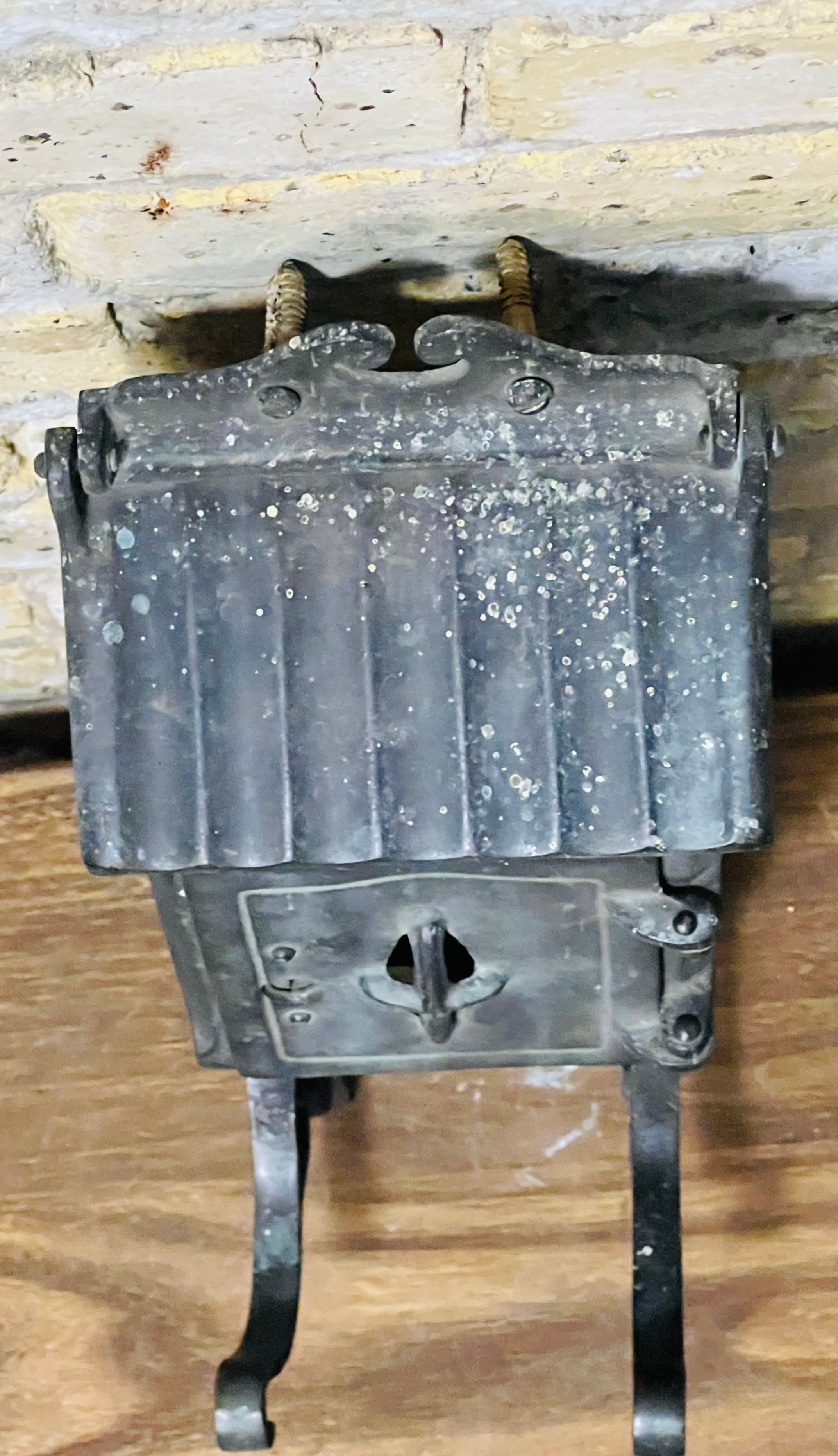 Vintage iron mailbox turn of the century era.