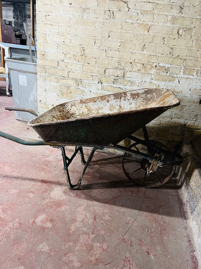 Vintage all metal wheelbarrow.