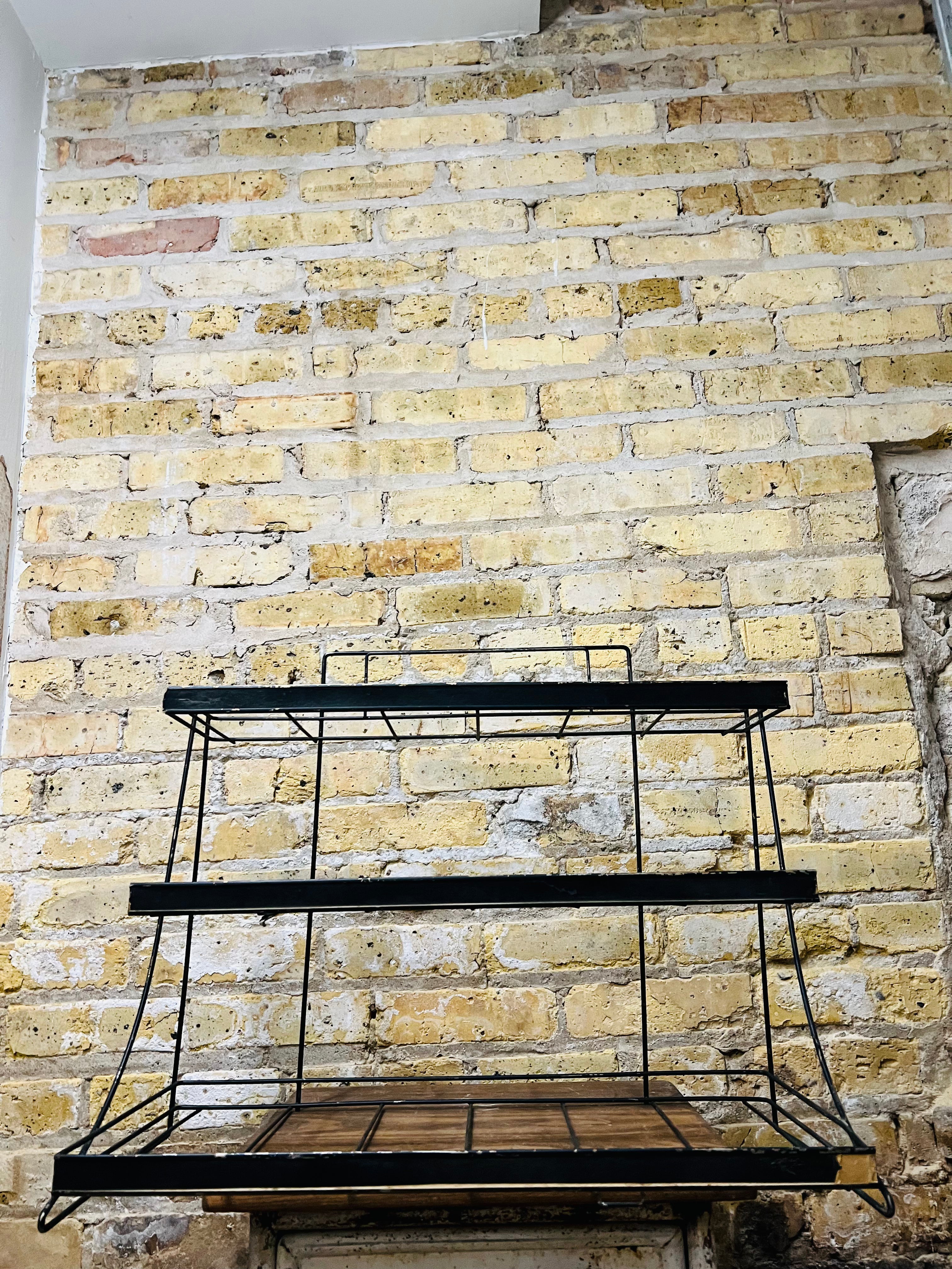 Vintage countertop wire product display rack.