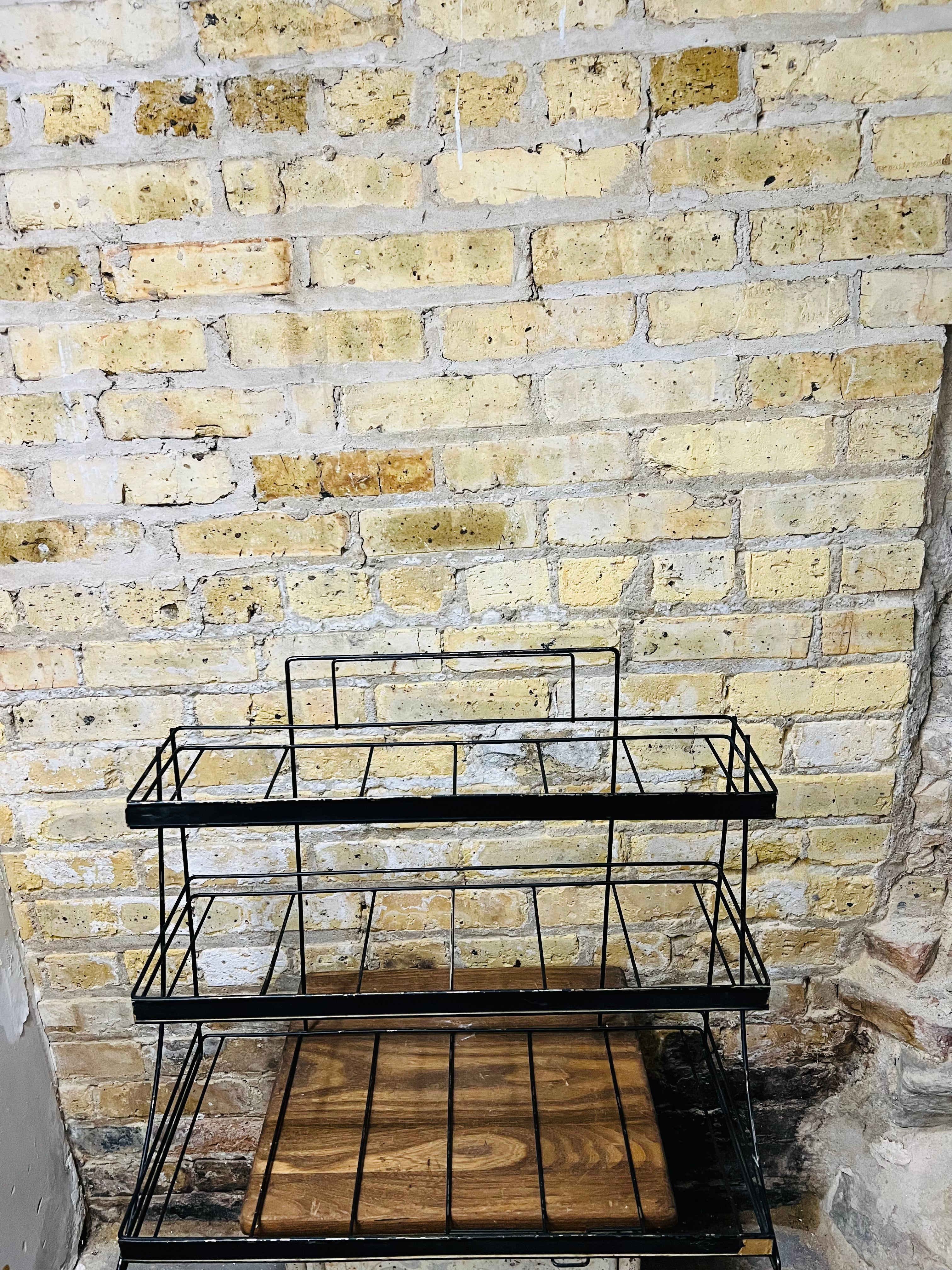 Vintage countertop wire product display rack.