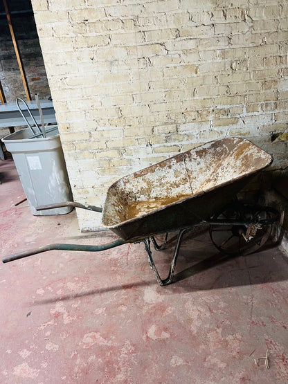 Vintage all metal wheelbarrow.