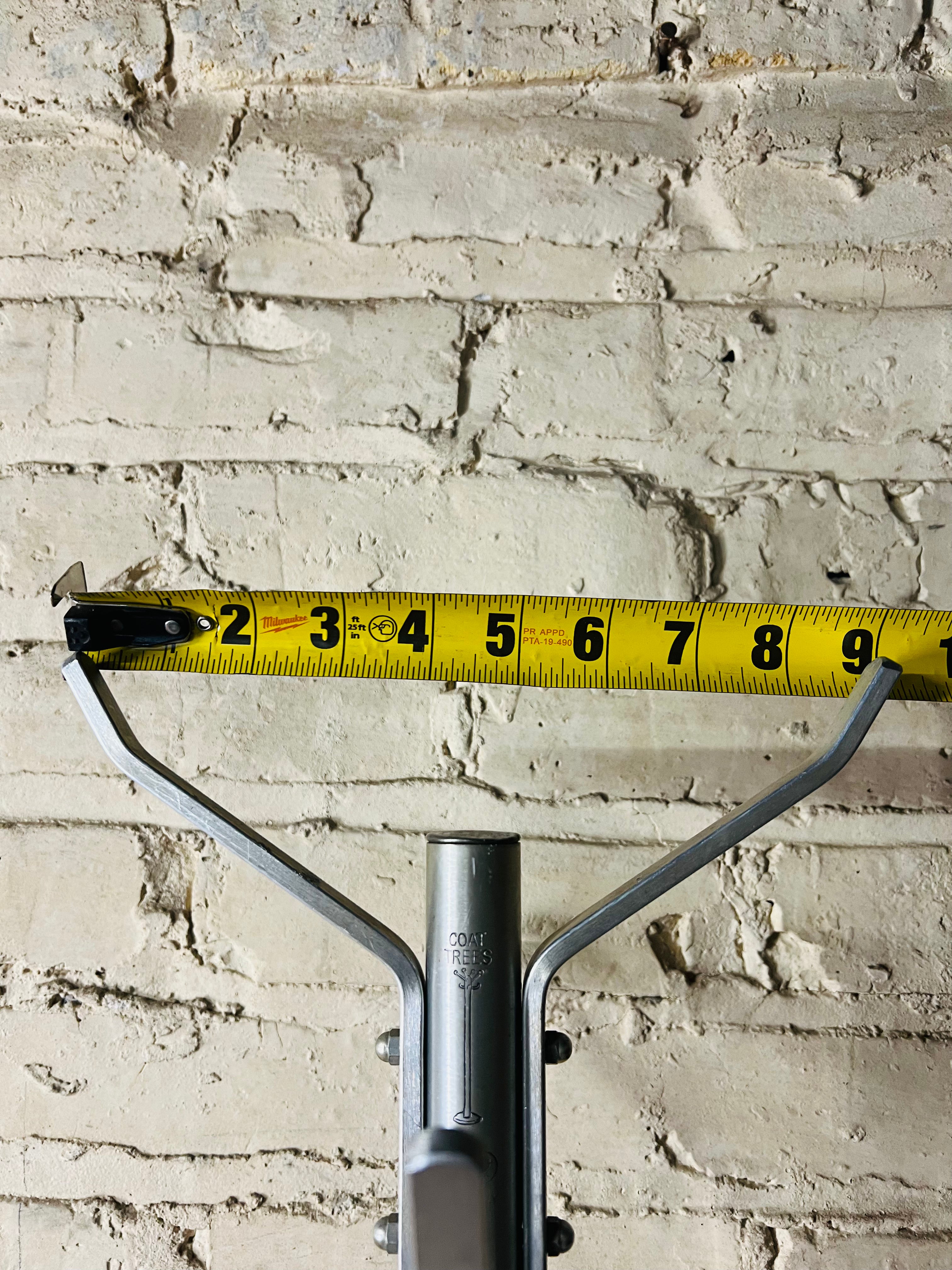 Vintage mid-century stainless steel coat rack.