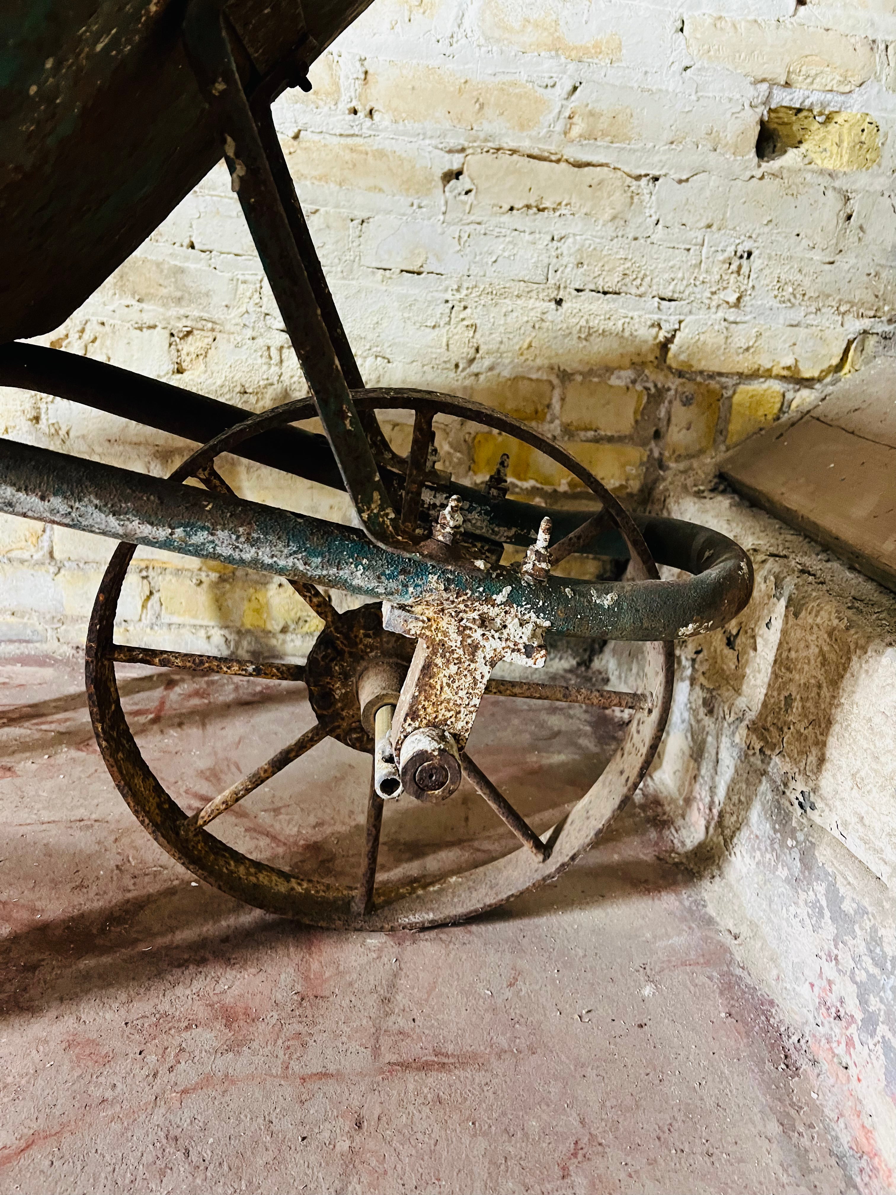 Vintage all metal wheelbarrow.