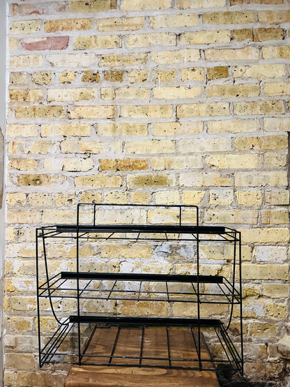 Vintage countertop wire product display rack.