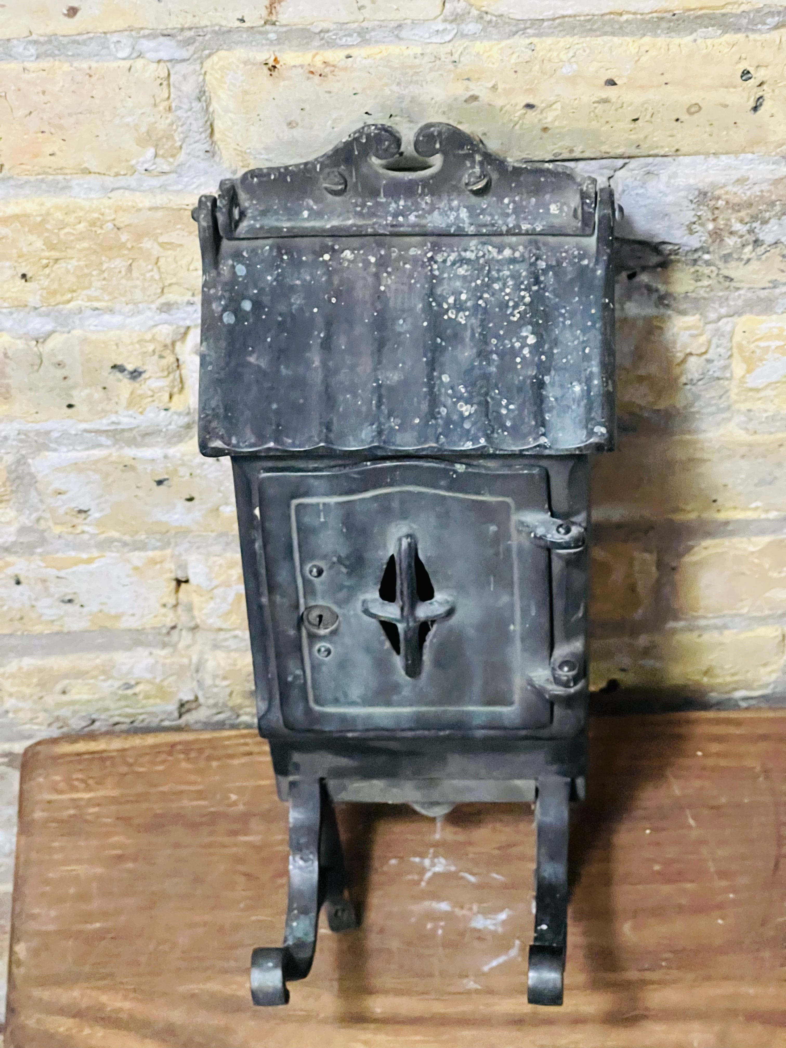 Vintage iron mailbox turn of the century era.