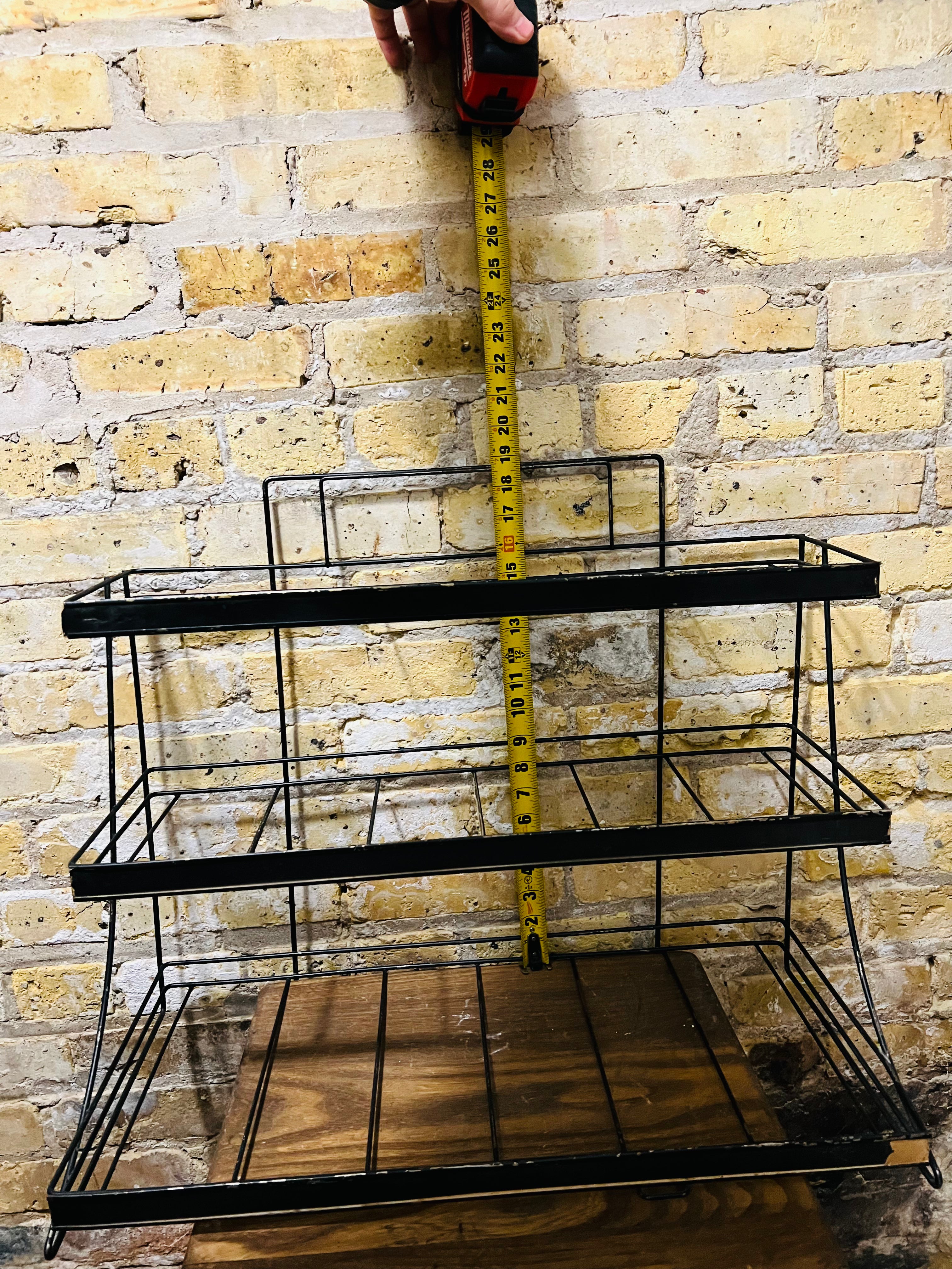 Vintage countertop wire product display rack.