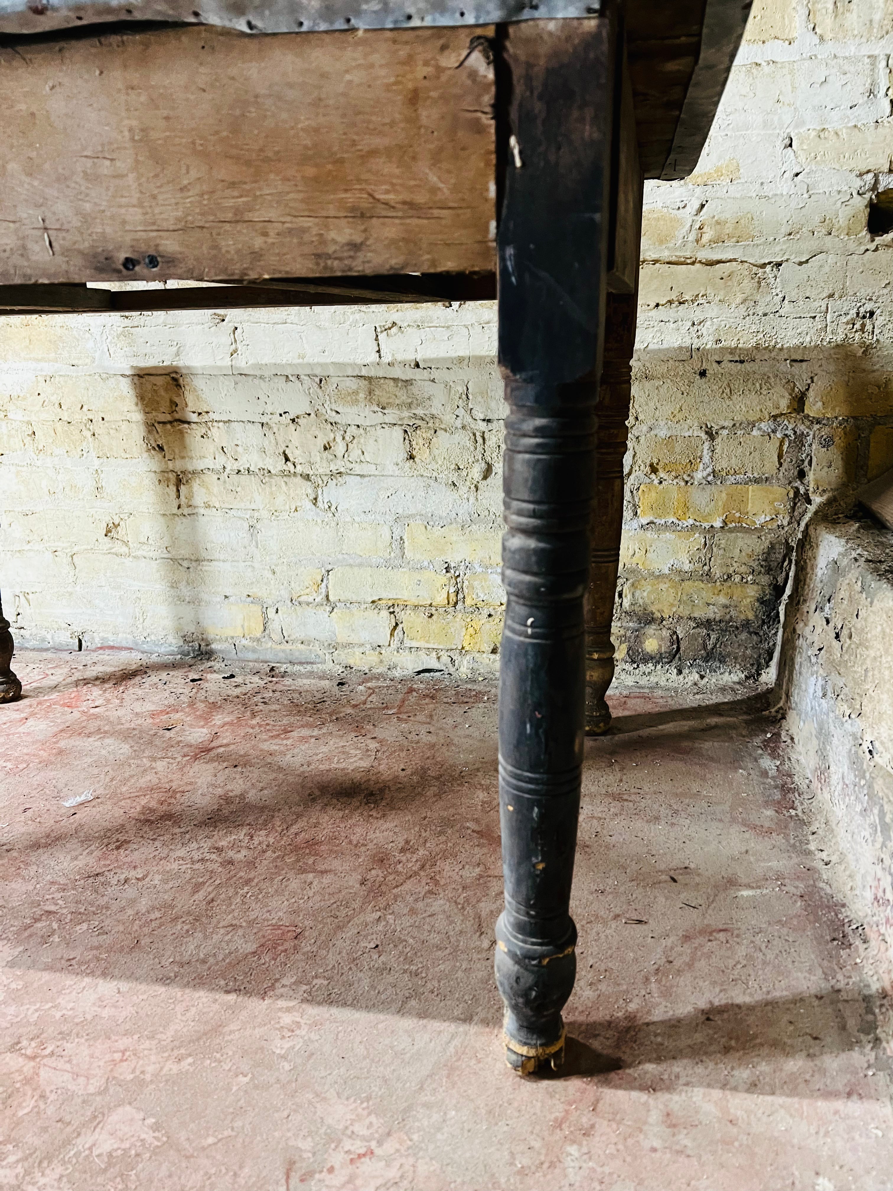 Vintage farm table with zinc top missing drawer.