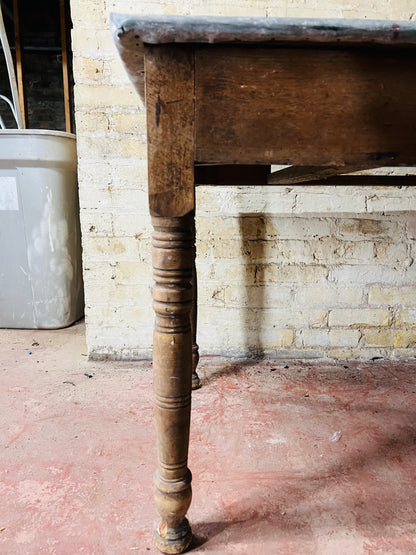 Vintage farm table with zinc top missing drawer.