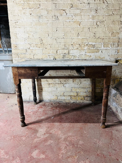 Vintage farm table with zinc top missing drawer.