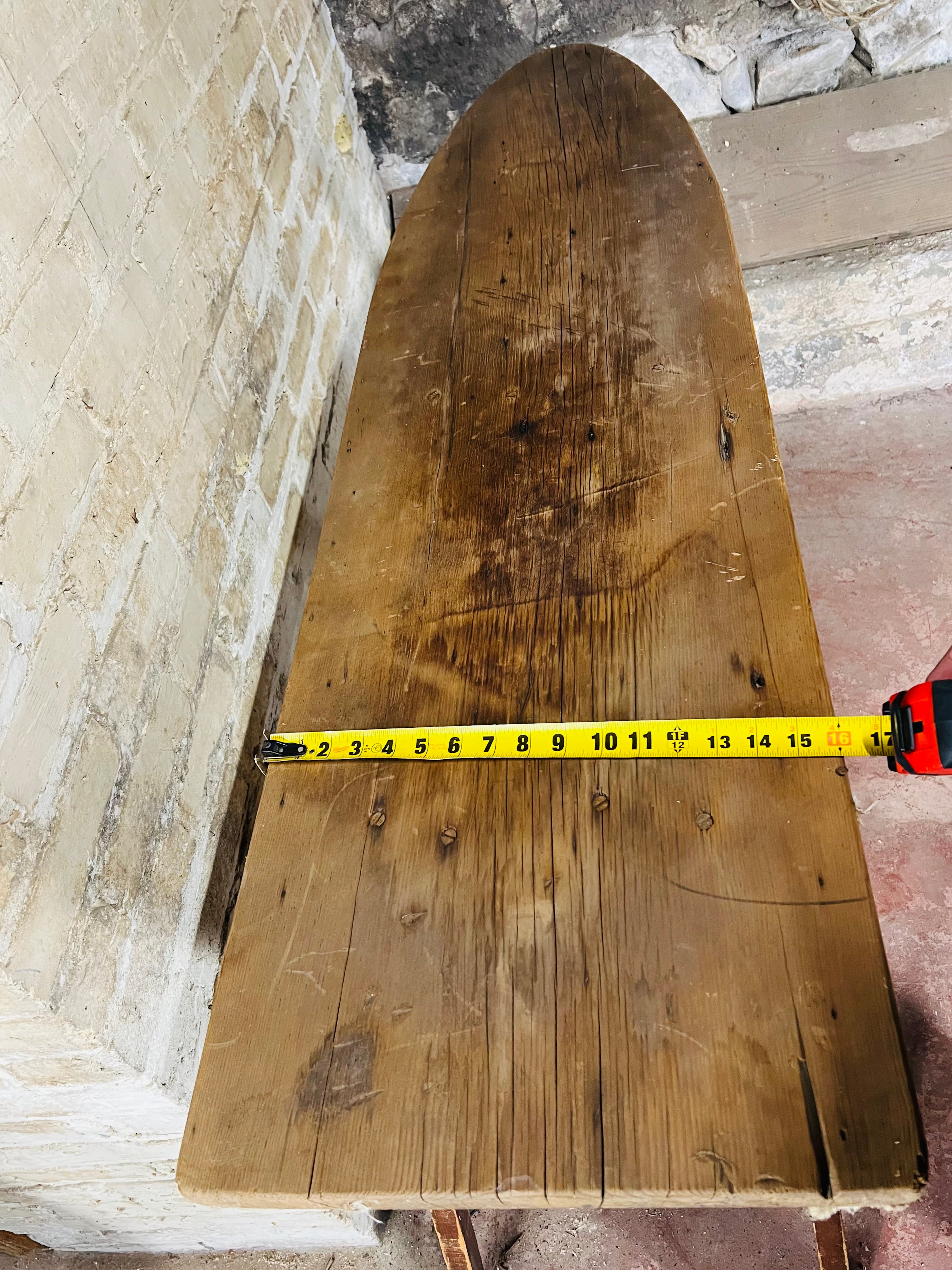 Vintage wooden folding ironing board.