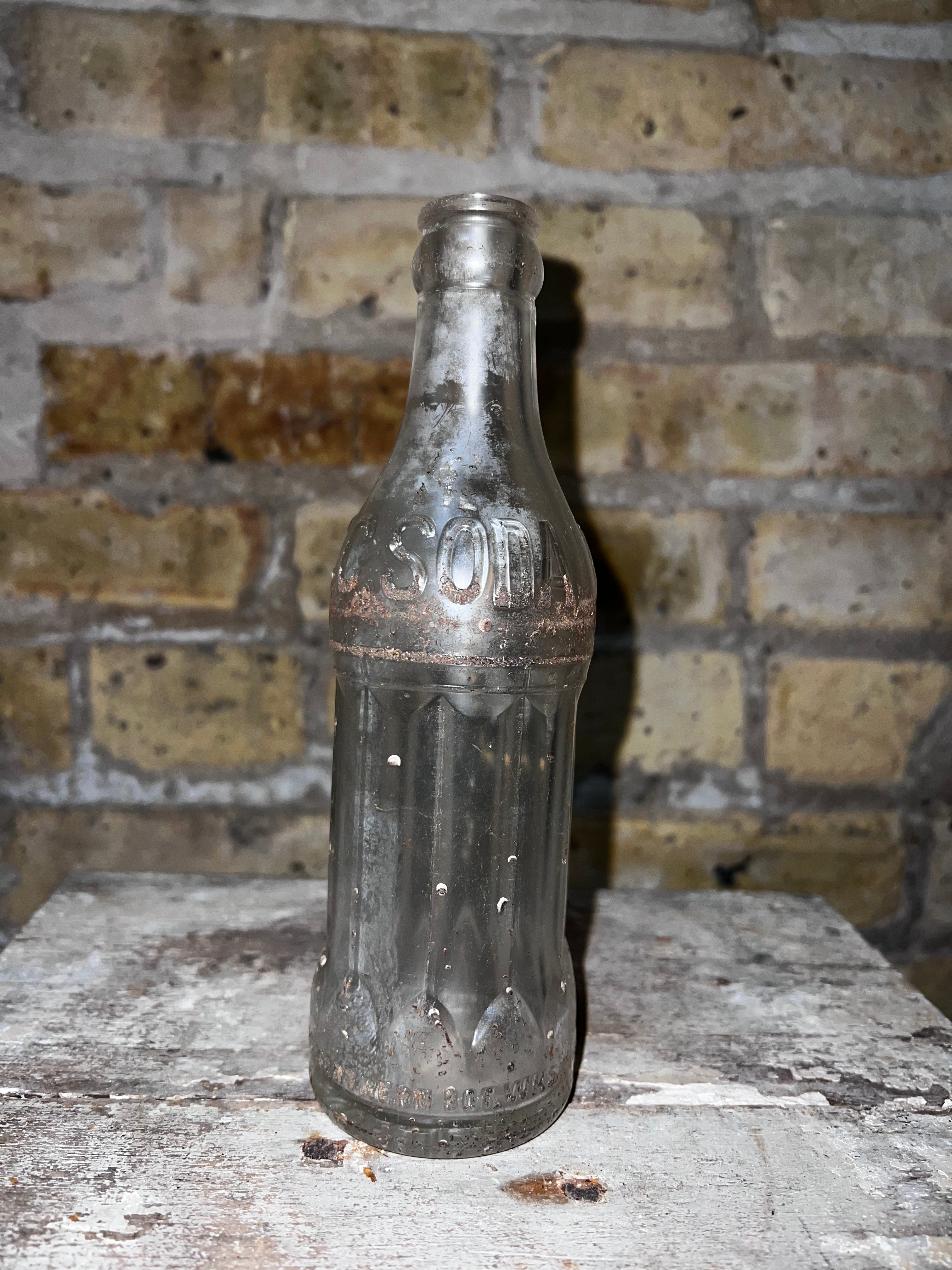 Clear Glass Soda Bottle