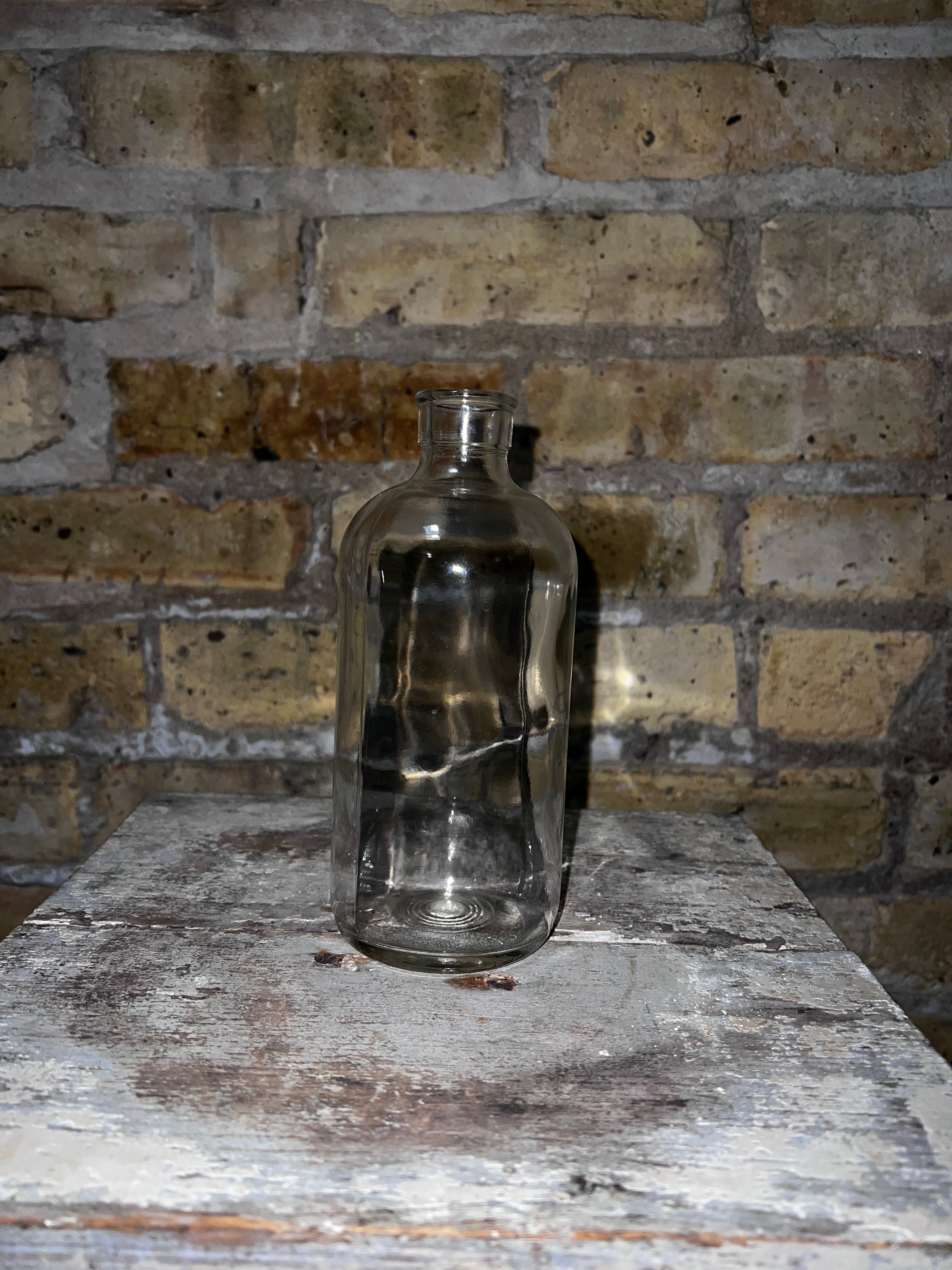 Circular Vintage Bottle