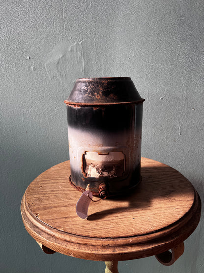 Metal canister with antique picture