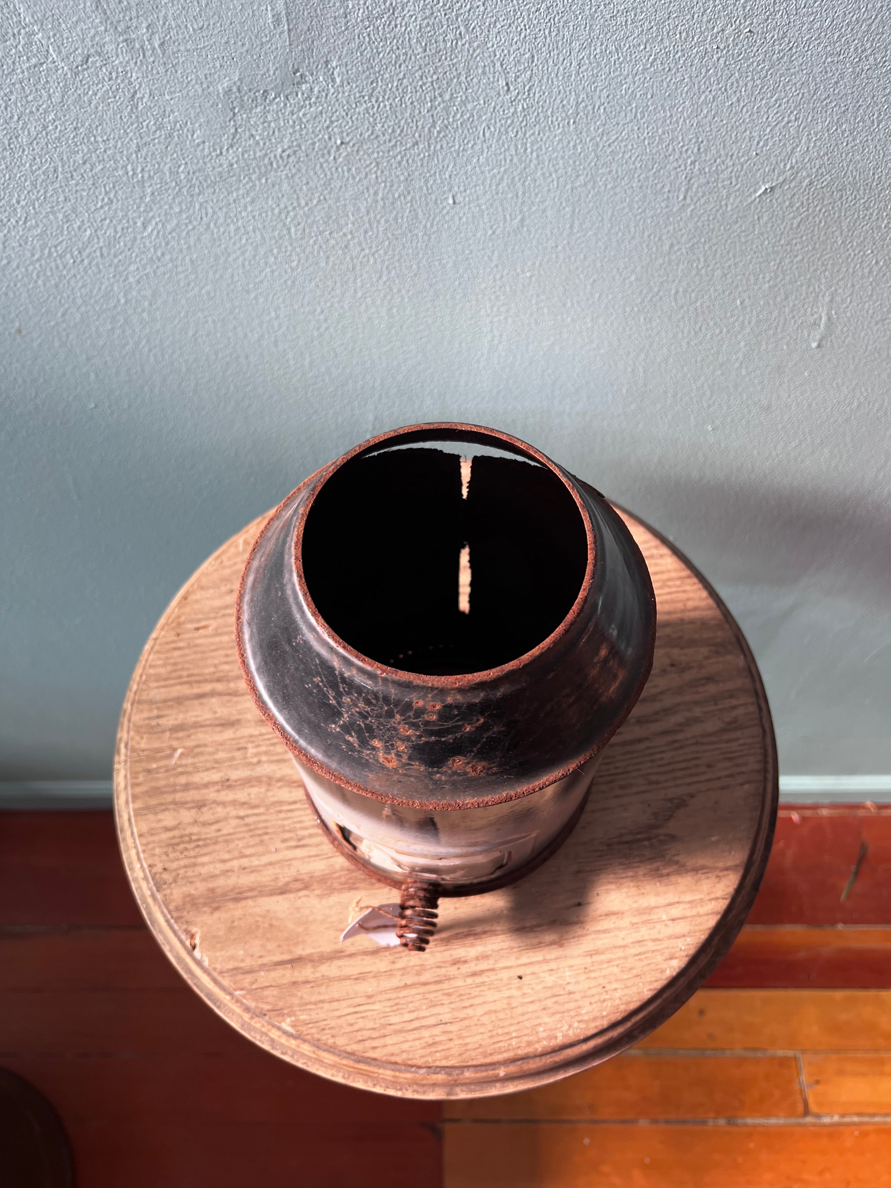 Metal canister with antique picture