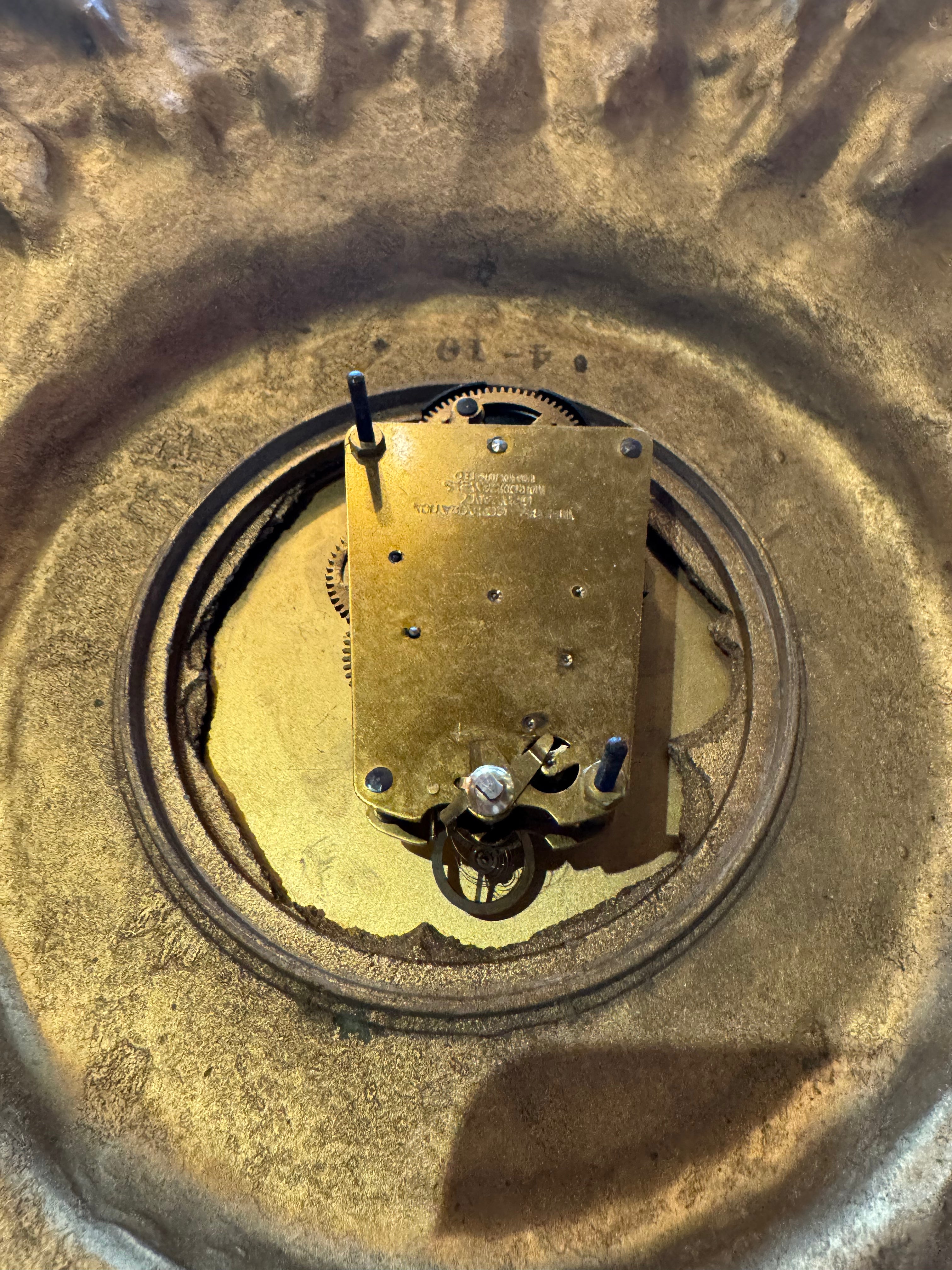 Mechanical Sunburst Wall Clock